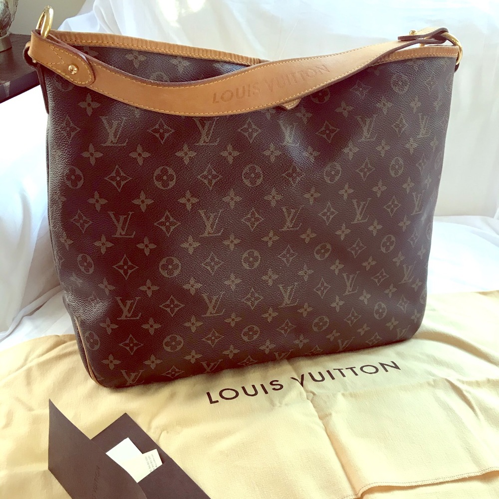 Louis Vuitton Delightful MM Monogram boho bag.